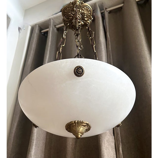 Alabaster pendant light or chandelier with aged patinated brass fittings in the Directoire style. Newly wired for US,...