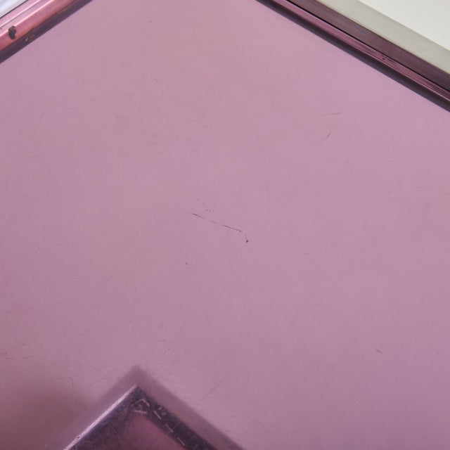 A sculptural 1970s French bar cart in the manner of Michel Dumas. The 3-tier, Z-shaped silhouette is crafted from chrome...