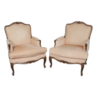 Pair of French Carved Walnut Louis XV Style Bergere Chairs For Sale