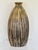 A large pottery vase with incised decoration. Impressed maker’s mark. Japanese studio ware circa 1960.