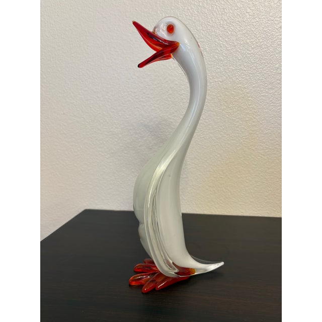 This sculptue is a handcrafted Italian Murano glass artwork featuring a heron using white glass encased in crystal with...