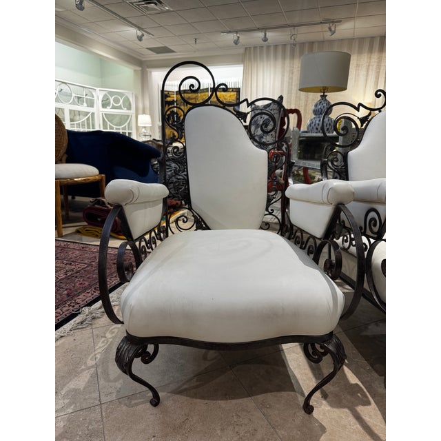 Vintage French Iron Lounge Chairs in style of Rene Prou c. 1940s. Wrought iron frames in scrolling and floral designs.
