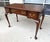 This Henkel Harris Solid Mahogany Vanity, Model No. 2704 and finish no. 29, features a graceful Queen Anne-inspired form...