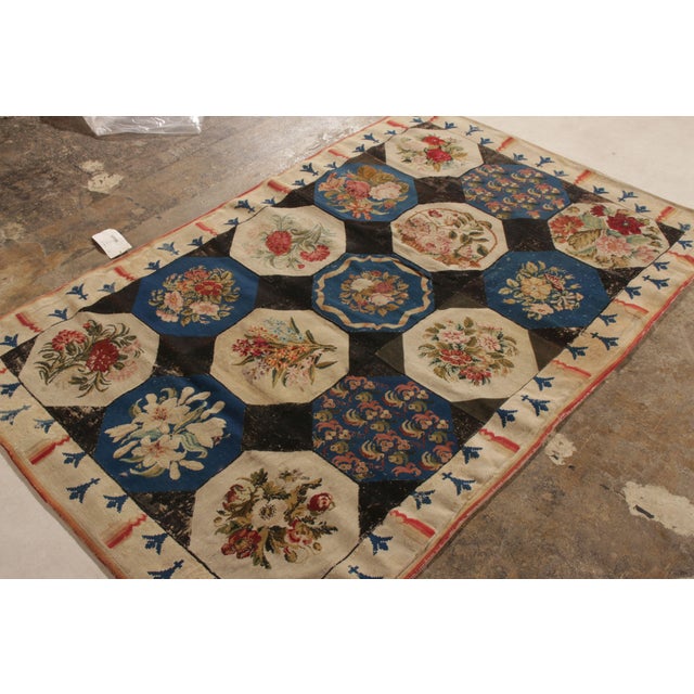 Handmade in wool originating from England circa 1920-1930, this needlepoint rug hails from Rug & Kilim’s classic...