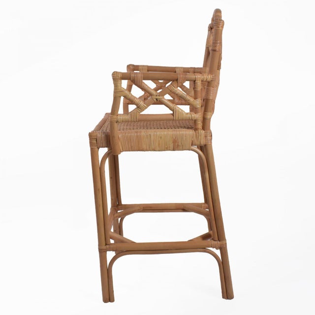 The Dale Bar Stool With Arms from the Circa Who Originals Collection — the same beloved bamboo and woven rattan...