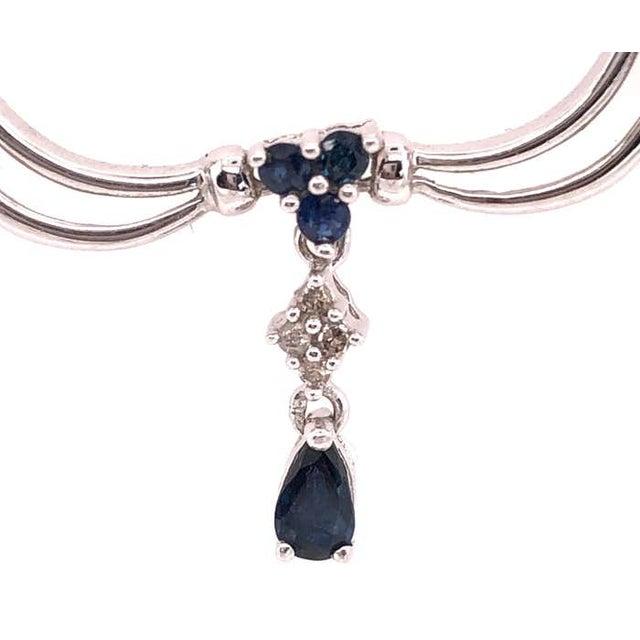 14Kt White Gold Fancy Link Drop Necklace W/ diamonds And Sapphires 0.08 Total Diamond Weight 9.36 grams total weight 18 inch