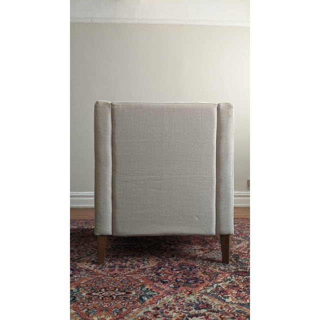 Elegant lounge chair from UK-based Sofa.com, originally purchased from their former New York showroom. Features English...