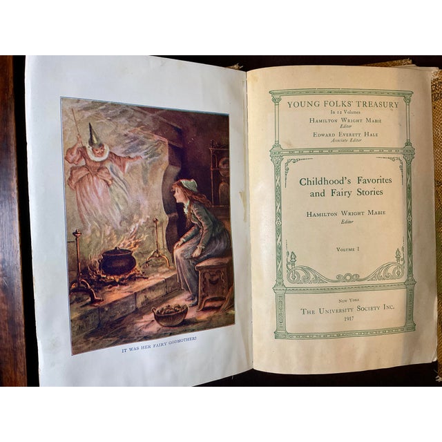 Good looking set of antique books with art nouveau graphics on cover and throughout the books.