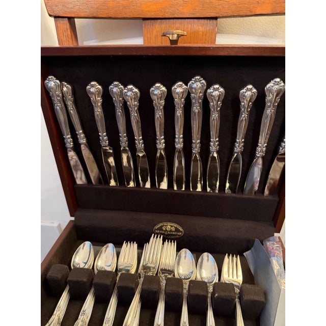 A comprehensive, museum-quality 103-piece antique sterling silver flatware service for 12 in the iconic "Chantilly"...