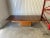 An exceptional and highly refined extendable dining table by Vladimir Kagan, featuring a spectacularly figured rosewood...