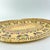 This vintage handmade basket, crafted by the Hausa people of Northern Nigeria, is an exquisite example of traditional...