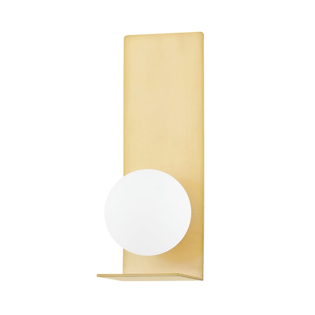 Art disguised as light, an opal matte globe shade appears to float on the large rectangular backplate. Soft light pours...