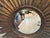A stunning oversized giltwood starburst mirror. Unusually large at 40.5" in diy, this mirror from the 1960's is sure to...