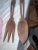 Beautiful carved African spoon and fork decor. Beautiful pieces to add to your collection. Solid wood. Great pieces....
