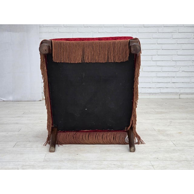1950s, Danish vintage armchair. Red furniture velour, oak wood, brass springs in the seat. Chair was reupholstered by...