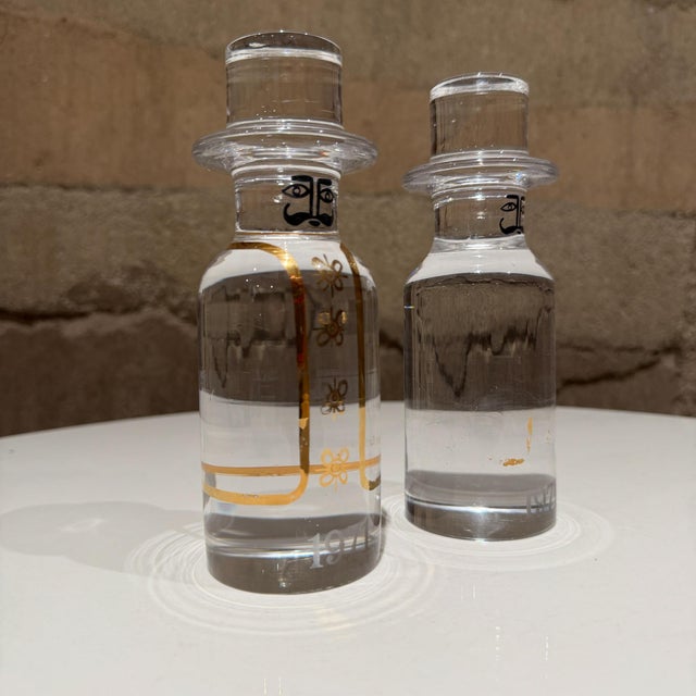 For your consideration, glass figurines are from the "Familjen" (Family) series designed by Ann and Göran Wärff for Kosta...