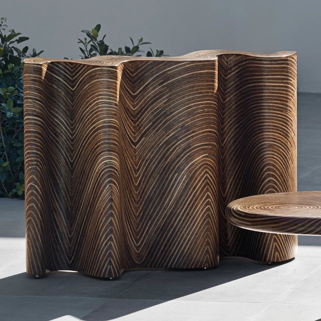 This rattan and coconut twig zigzag console table adds organic modern texture to an entryway, hallway, or the back of a...