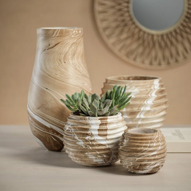 Simple accent pieces can make all the difference in reaching that finished look when decorating. Made of elegantly shaped...