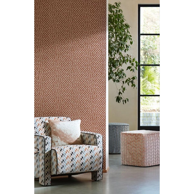 An embossed vinyl in a wide width Skiva uses ombre tones to create a dimensional quality to this wallcovering. Inspired by...