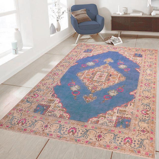 Enhance your living space with this stunning vintage Persian hand-knotted wool rug, a true showstopper that effortlessly...