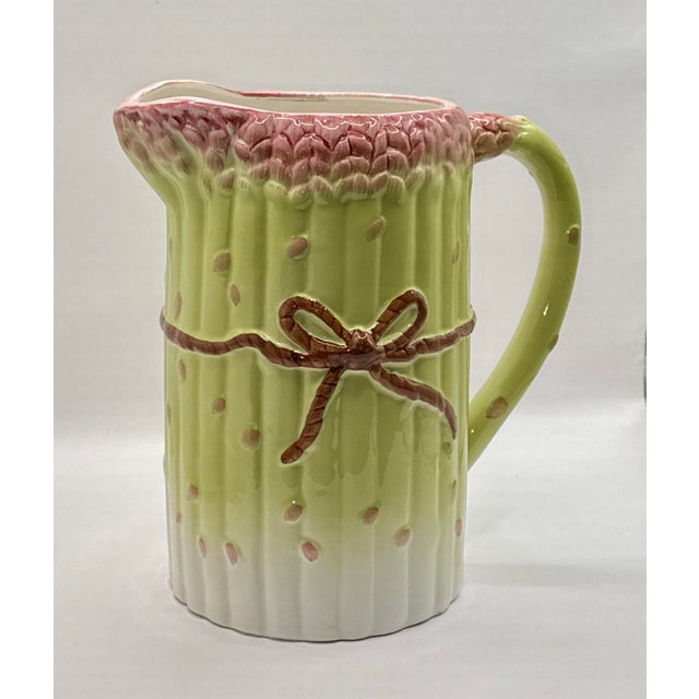 Vintage Trompe l'oeil porcelain water pitcher made with light green and light raspberry pink asparagus stalks and tied...