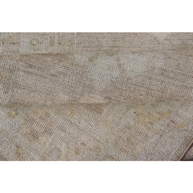 Long Soft Oushak Runner With Sand Field and Pale Green and Blue Accents For Sale - Image 11 of 12