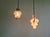 Magnificent pair of multicolored blown Murano glass pendant lights, 1950s-60s. Each pendant light has been restored and is...