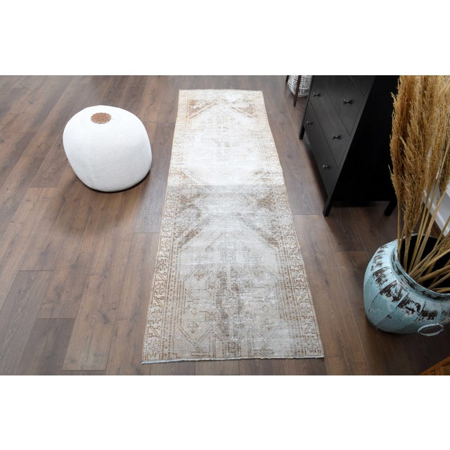 Vintage Hand-Knotted area rug is a semi-antique vintage area rug. The '70s Eastern region of Anatolian's unique rug is...