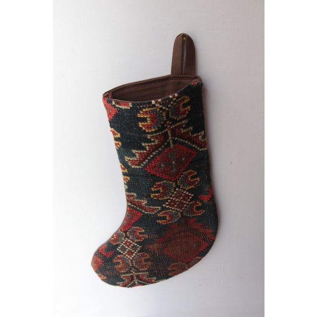 Designer Holiday Stocking Crafted from Antique RugCelebrate the season with this one-of a kind Christmas stocking,...