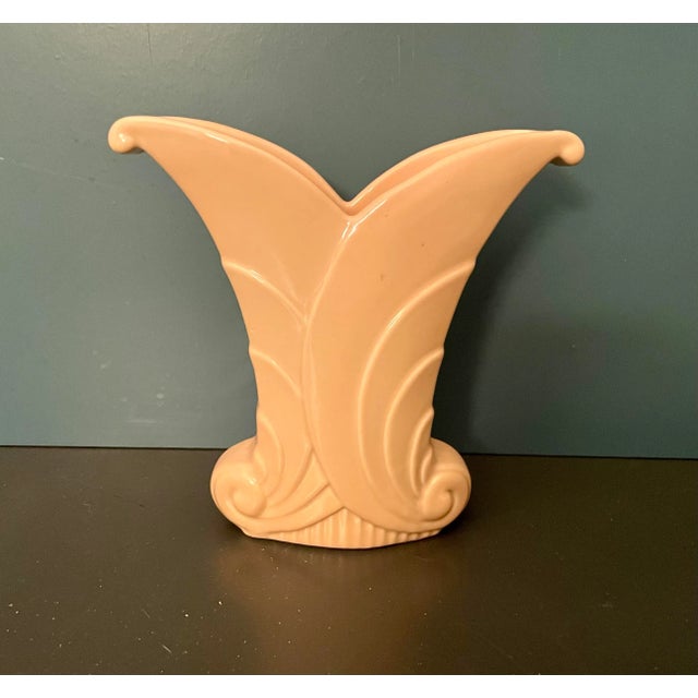 This ornate yet simple Art Deco style vase and pair of matching double candlesticks is stamped Abingdon Co., U.S.A. circa...