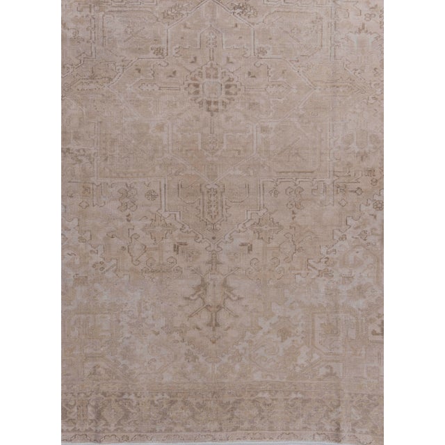 A soft and subdued Heriz rug with character and charm. The soft coloration coupled with the low pile adds the patina so...