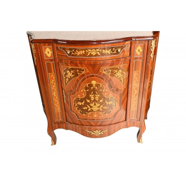 Gorgeous pair of French Empire style cabienets. Lovely demi lune form and each chest features plethora of intricate...