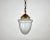 Frosted glass pendant light in brass fittings. The frosted glass give a lovely, soft glow whilst the ribbed, floral design...