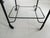 A Mathieu Matégot Rolling Bar Cart. France, circa 1955-1956. Painted metal. Wave-pleated top apron in perforated metal,...