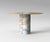 Jumbo Calacatta Table by Etamorph Dimensions: ⌀ 120-140 x H 74 cm. Materials: Calacatta + Brass. Base carved from a block...