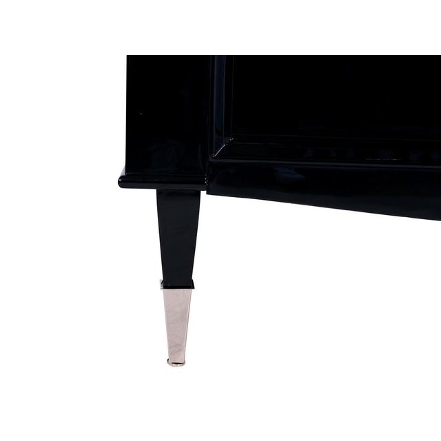 Art Deco Sideboard in Black High-Gloss Lacquer with Chrome Sabots and Chrome Fittings, 1940s, in Restored conditions....