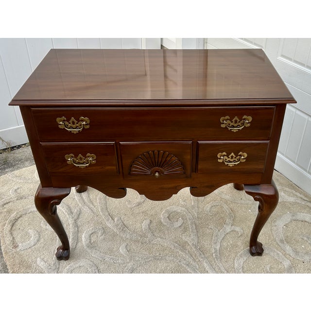 Vintage (1980's) Lowboy has a Queen Anne Style. Made by Ethan Allen. The Wood is Mahogany. The Piece has Four Drawers with...
