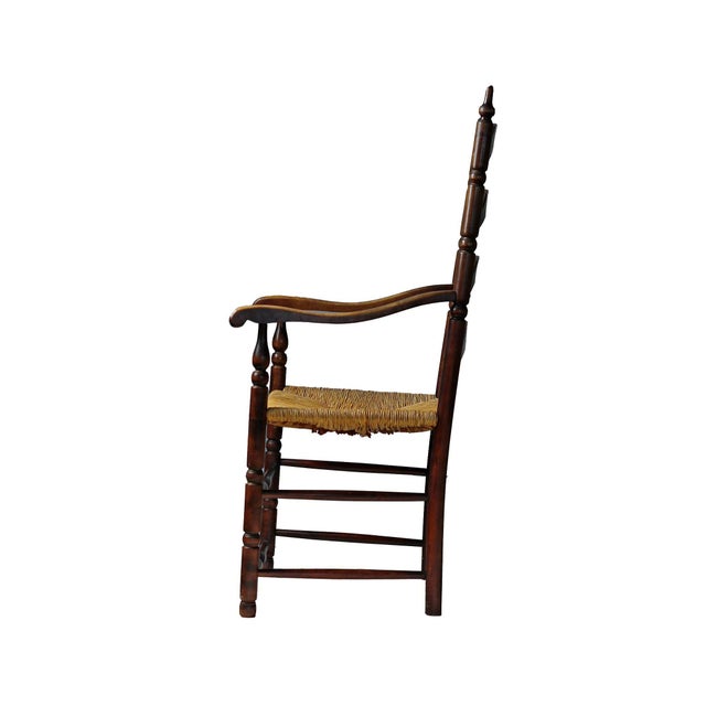 Pair of antique William and Mary style ladder back armchairs. Woven rush seats, wavy slats (also called "rungs") and...