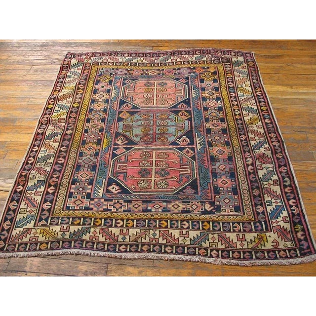 Early 20th Century Caucasian Shirvan Carpet ( 4' x 4'6'' - 122 x 137 ) This early 20th-century antique tribal Caucasian...