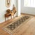 Enhance the ambiance of your home with this magnificent Persian-influenced Turkish hand-knotted rug made by skilled...