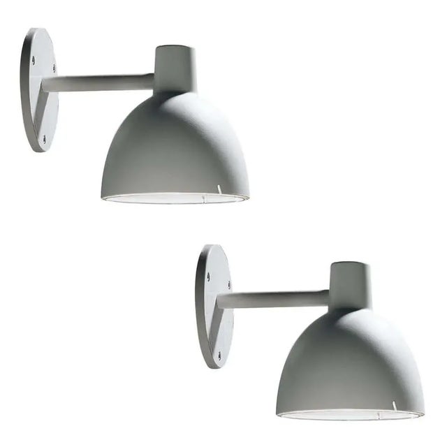 Louis Poulsen 'Todbold' Outdoor Wall Light in Natural Aluminum. The Toldbod 6.1" Wall was launched in 2006, with a design...