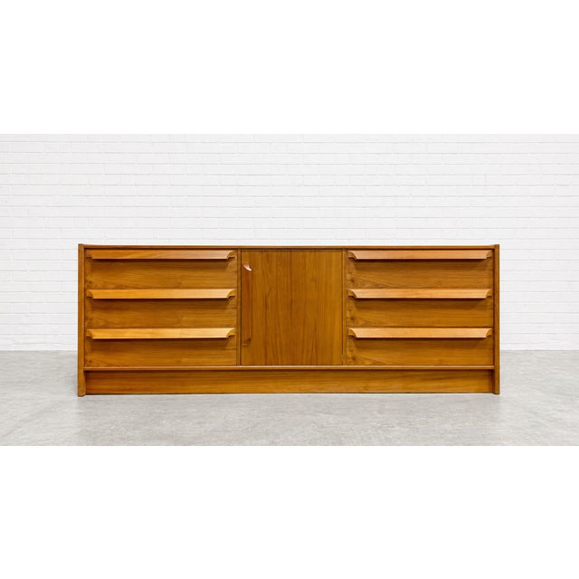 Sculpted Mid Century Modern Danish Teak Credenza / Long Dresser by Skovby Mobelfabrik. This gorgeous credenza features...