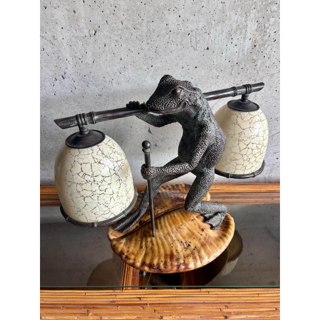 Fantastic vintage table lamp by Maitland-Smith, featuring a wonderfully sculptural frog balancing a bamboo-form pole with...