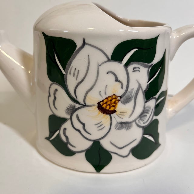 Charming small vintage Magnolia watering can planter for bouquets or decor. Ceramic.