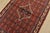 An authentic vintage tribal Hamedan rug hand-knotted with fine wool and natural dyes. This nomadic rug features a central...
