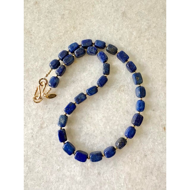 Gorgeous, lapis and gold tone beaded necklace designed by Matthew Izzo