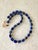 Gorgeous, lapis and gold tone beaded necklace designed by Matthew Izzo