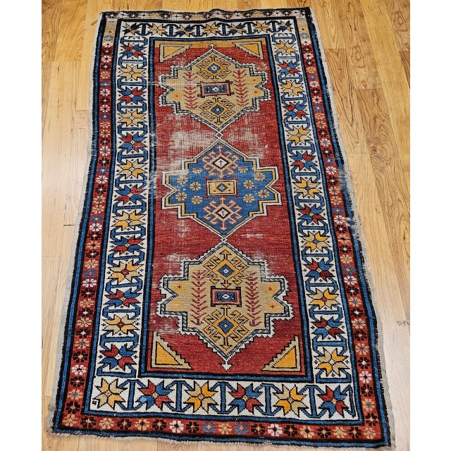 An exceptional vintage handwoven Caucasian Kazak area rug, crafted in the fourth quarter of the 19th century, showcasing...