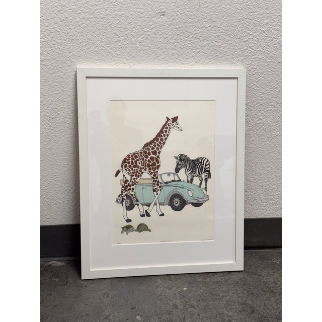 Design Plus Gallery presents a “Jungle Bug” Framed Art Print from Jacquie Schmidt. This whimsical composition depicts a...