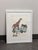 Design Plus Gallery presents a “Jungle Bug” Framed Art Print from Jacquie Schmidt. This whimsical composition depicts a...